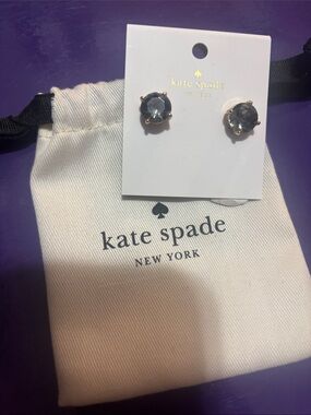 Earrings on Kate Spade pouch